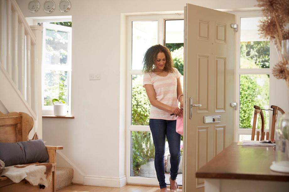 woman walking in door